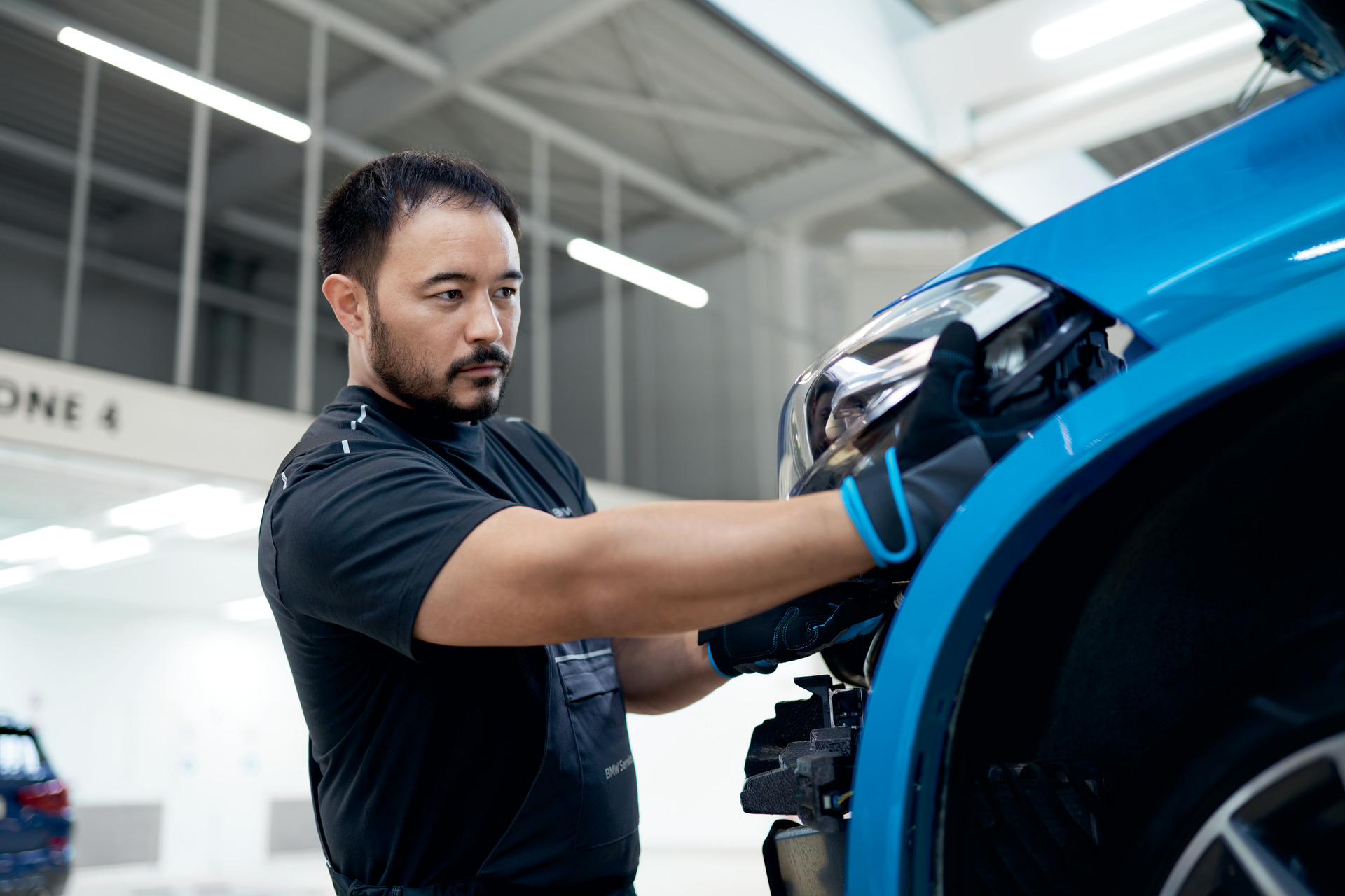 BMW Trained Technician working on the front end of a BMW at BMW of Jackson