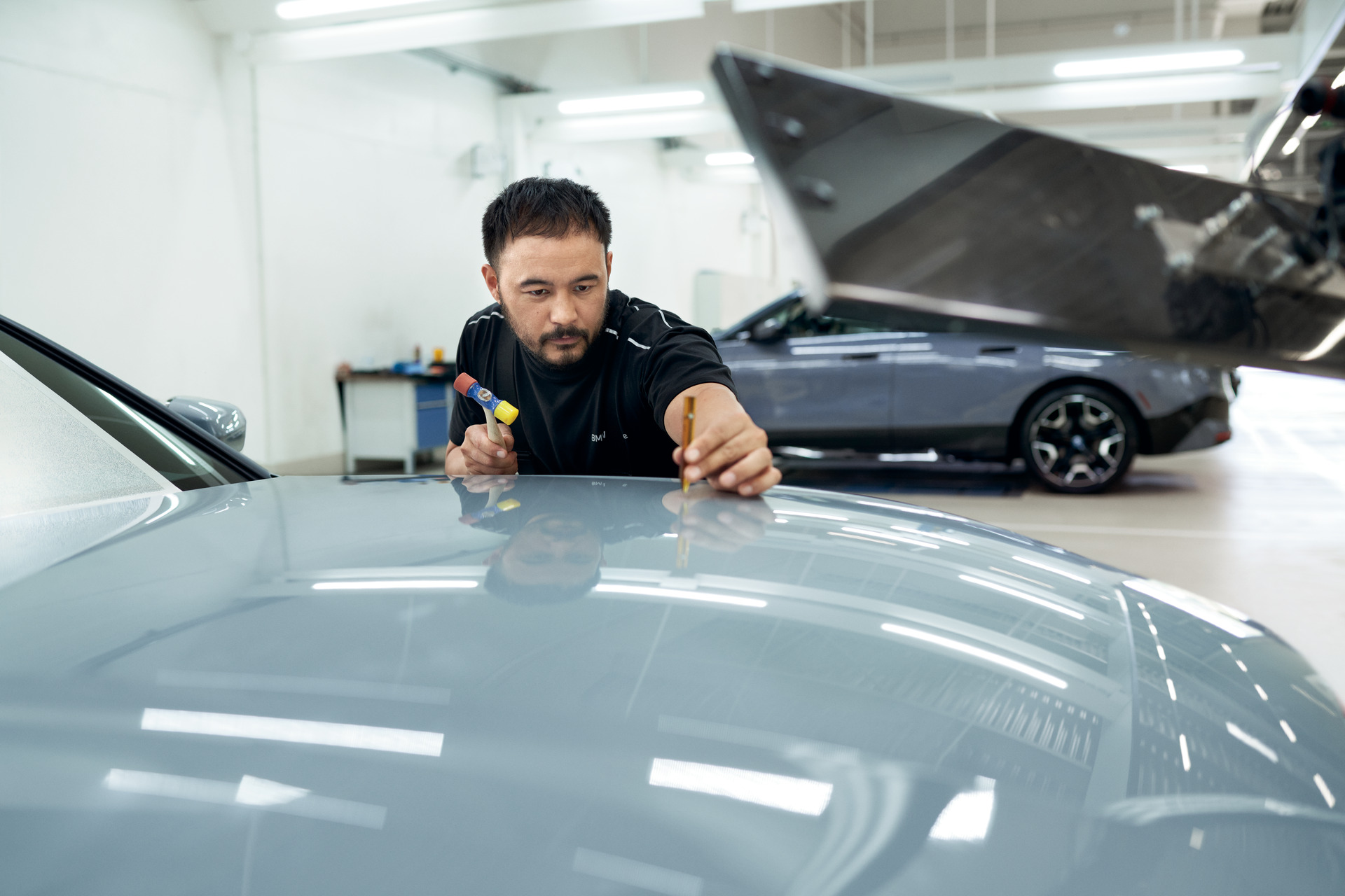 Quality inspection board inside the BMW of Jackson Certified Collision Repair Center