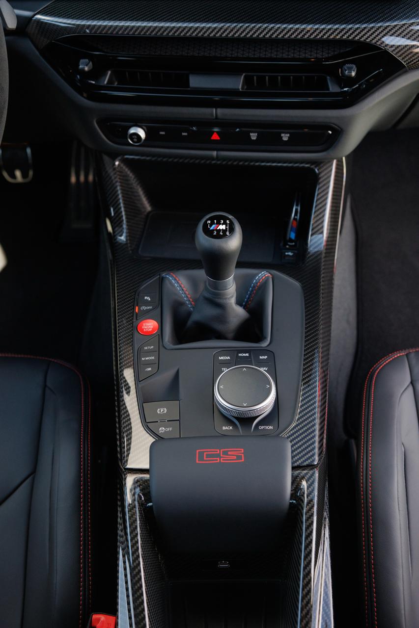 BMW 2027 M3 CS Handschalter manual shifter and center console vertical detail