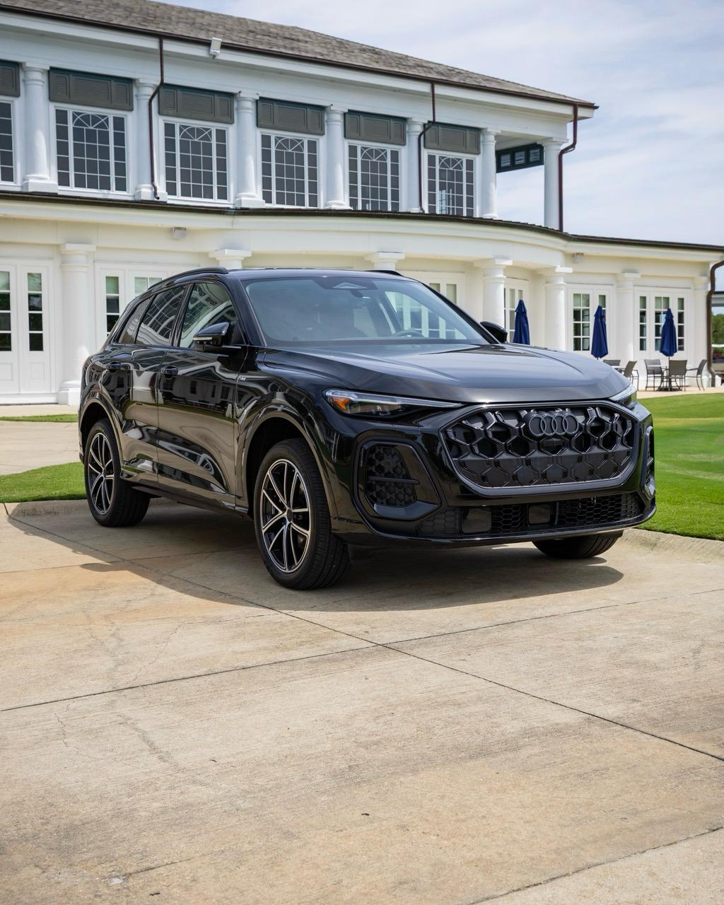Black Audi Q5 at golf club